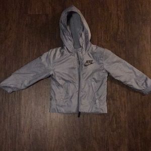 A kids grey nike jacket